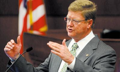 Rep. Amodei speaks at a podium